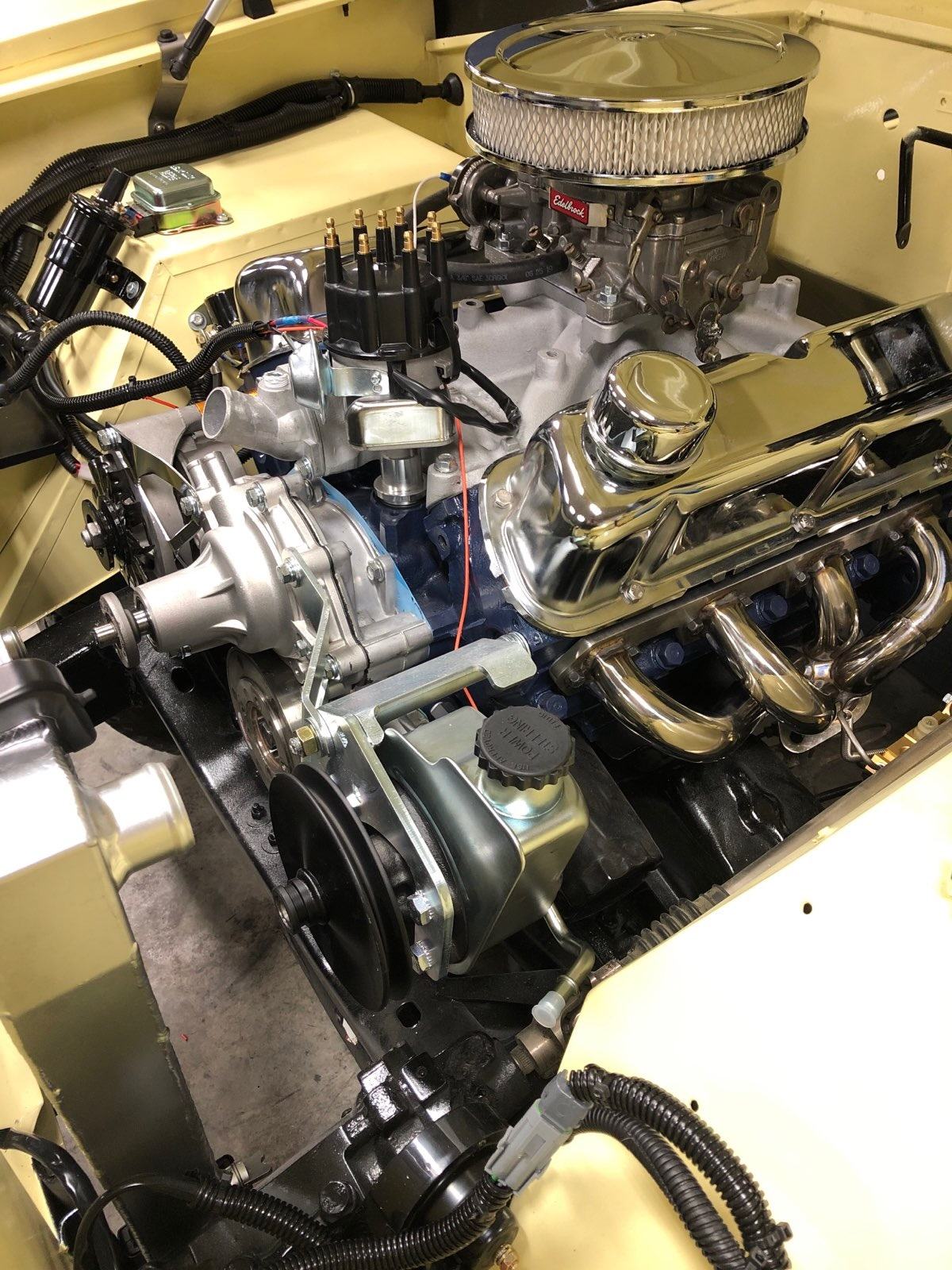 Rebuilt Ford 302 V8 installed in the freshly painted engine bay